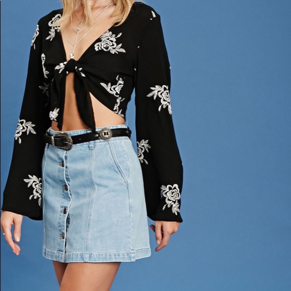 Light blue button front denim skirt